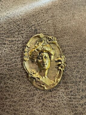 Gold-tone Art Nouveau Woman Brooch